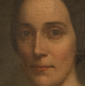 a close-up of a painting of a woman's face under normal light